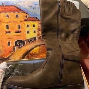 Boots, new without tags but still in box and has original plastic.